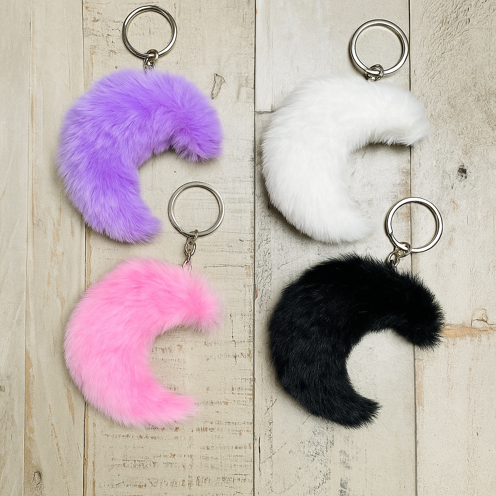 🌙 Lunar Glow Pom Keychains